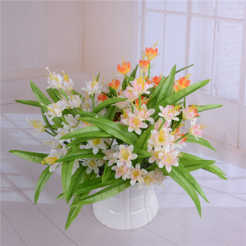 The artificial flower figure is a fake flower with 10 narcissus flowers