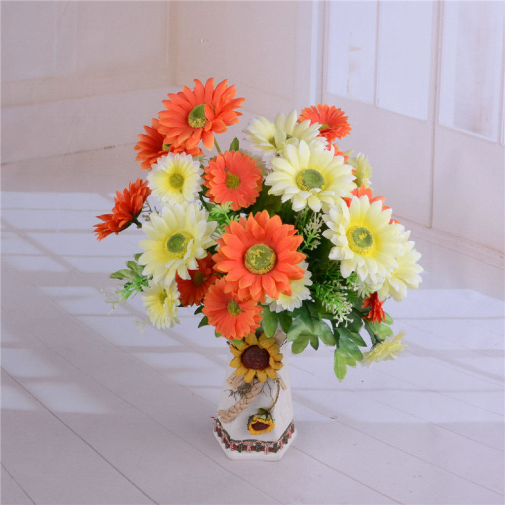 The simulated flower figure is a fake flower with 12 green-core gerberas details Picture