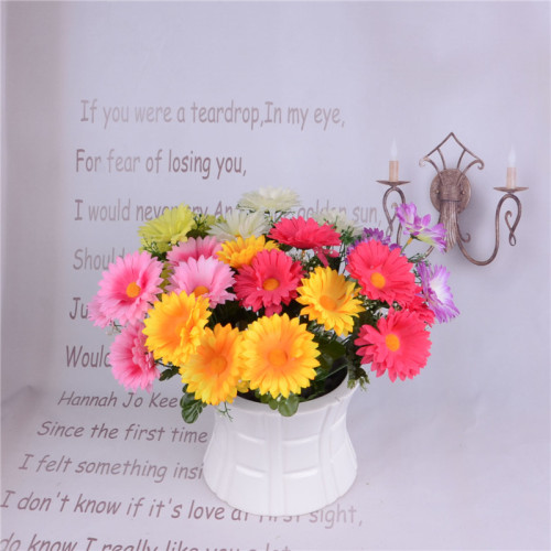 The artificial flower figure is a fake flower with five yellow-tipped chrysanthemums full figure