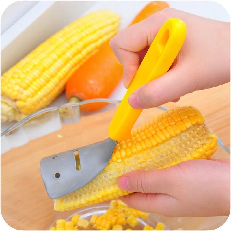 Kitchen gadgets: British smiley face corn peeler, corn kernel thresher, peeler, stripper