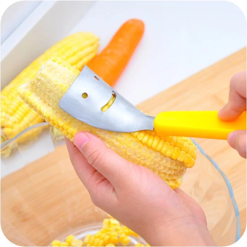 Kitchen gadgets: British smiley face corn peeler, corn kernel thresher, peeler, stripper details Picture