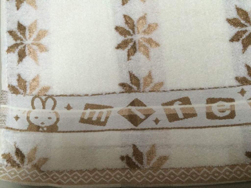 Factory direct sales of kapok, Miffy Rabbit leaf jacquard ribbon towels, supermarket gifts, advertising and creative towels Specification image