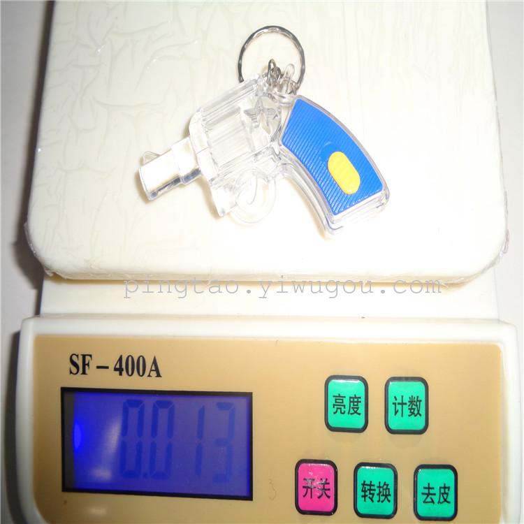 Children's toy 001 gun keychain light event gift, LED night light, illuminated street stall supply, factory direct sales Application Scenario