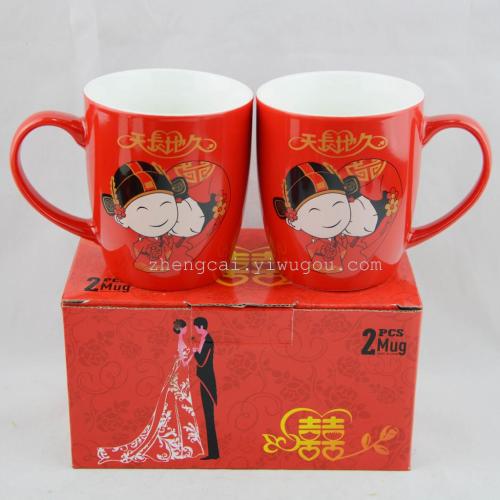 Ceramic red wedding cups for the bride and groom as wedding gifts