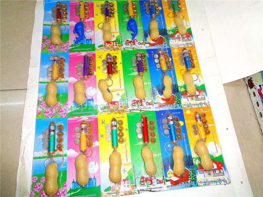Children's toys with five-head laser and peanuts as gifts, LED keychains, night lights, direct sales from street stalls