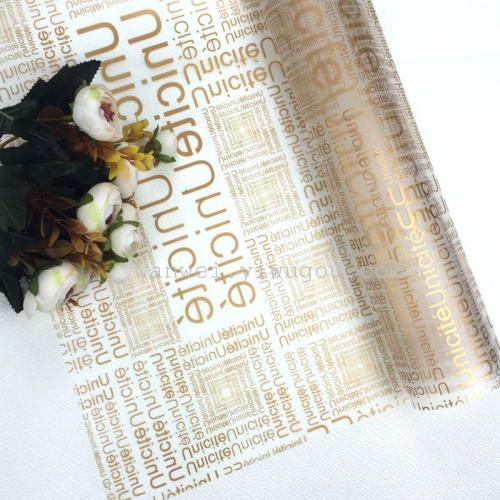 Yiwu City packaging materials printed with English characters, matte paper, flower packaging materials