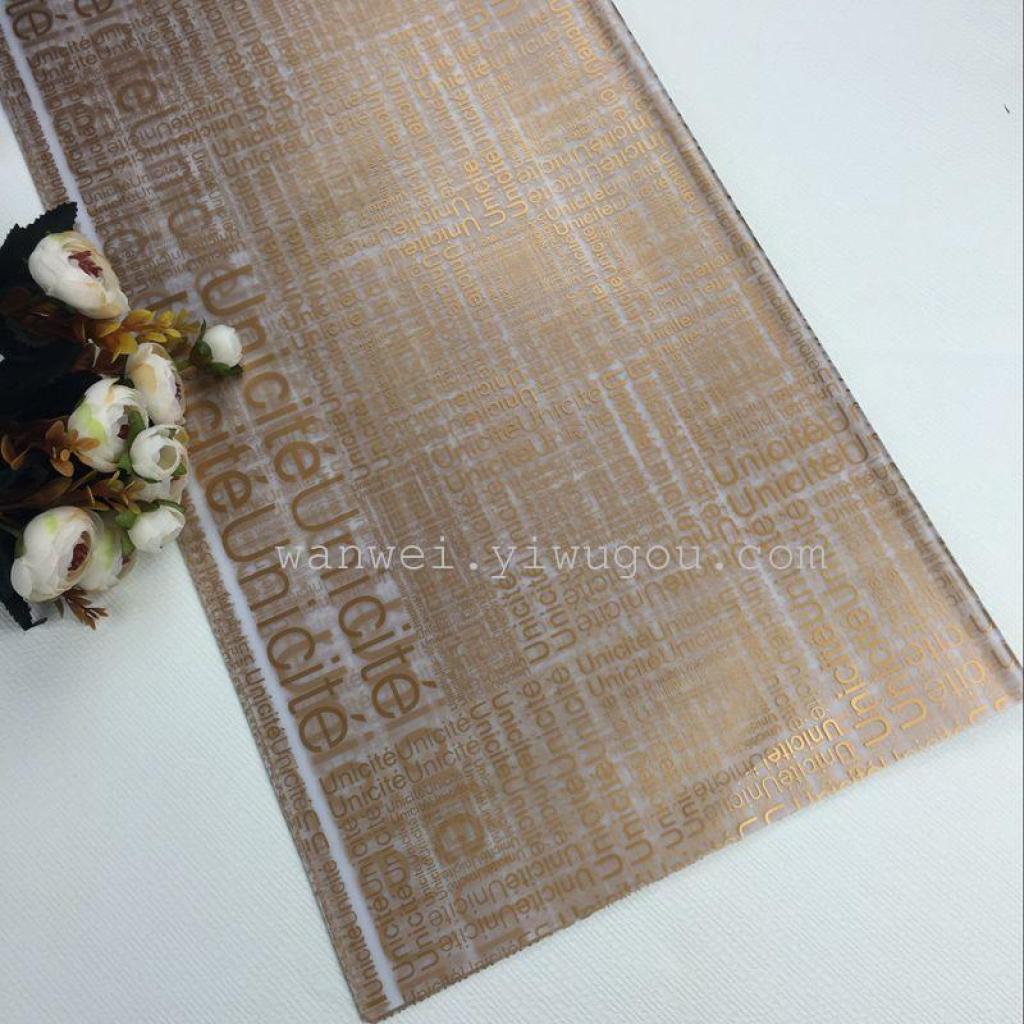 Yiwu City packaging materials printed with English characters, matte paper, flower packaging materials Specification image