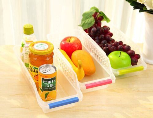 A hollowed-out drawer-style storage box for food and beverages in the refrigerator