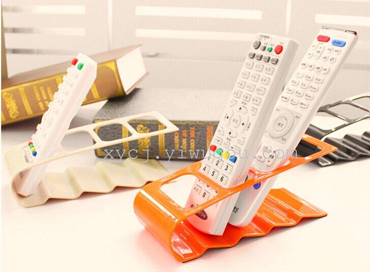 Korean version creative four-compartment remote control storage rack, plastic desktop storage rack and storage seat Application Scenario