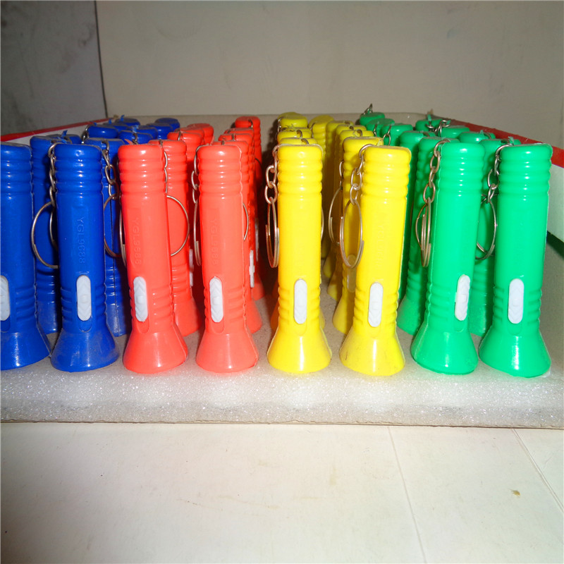 Children's plastic toys, keychain lights, complimentary gifts, LED night lights, street stall supplies, illuminated 9688 flashlights
