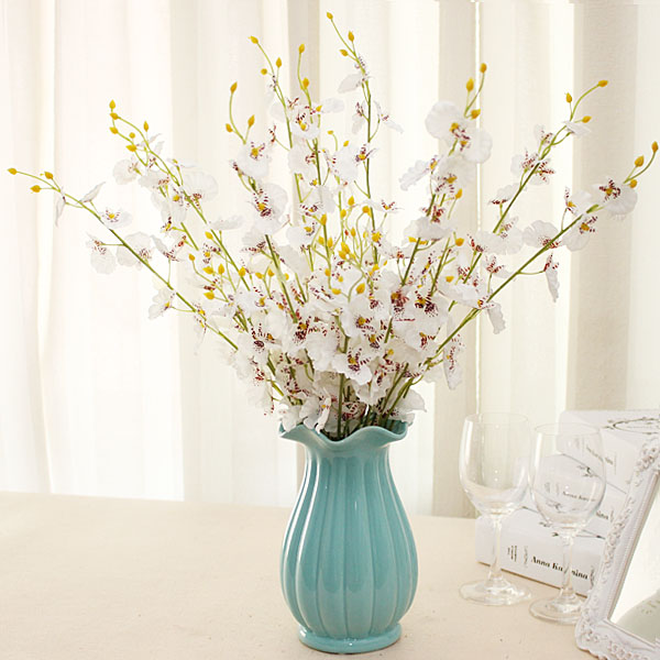 Simulated dancing orchid, simulated flower, simulated bonsai flower, plastic flower, simulated artificial flower, simulated lawn details Picture