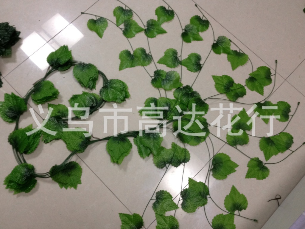 The grape leaf simulates the grape vine, simulates the plant, the decorative cane simulates the vine simulates the leaf