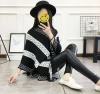 Striped color-blocking large-sized shawl cape knitted sweater, V-neck pullover, European and American sweater for women Application Scenario