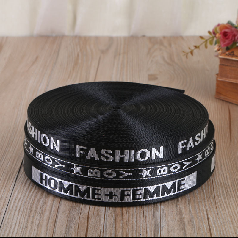 Letter belt imitation nylon jacquard webbing spot jacquard webbing manufacturers to carry the word webbing manufacturers luggage belt