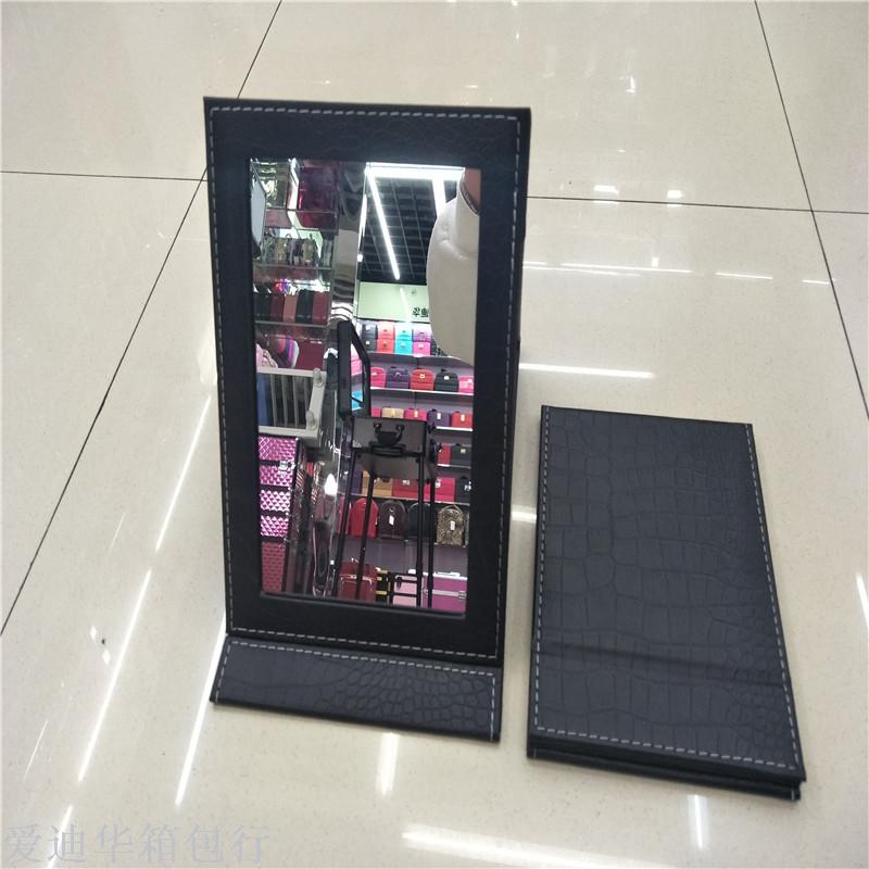 The trumpeter is holding a makeup mirror details Picture