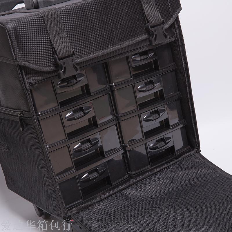 Large-capacity multi-layer multi-functional Oxford fabric waterproof universal wheel adjustable pull rod cosmetic case, black Application Scenario
