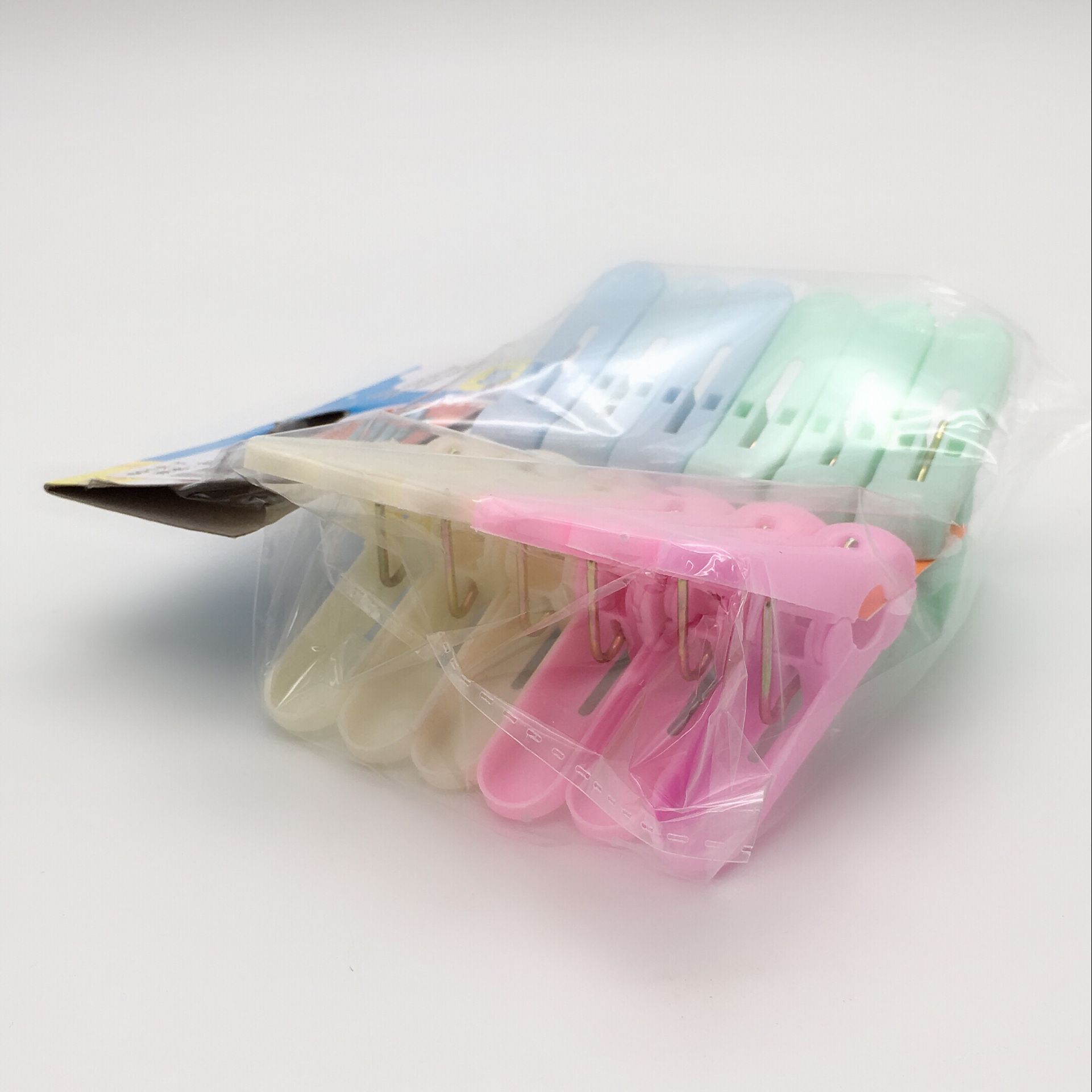 Sunshine Department Store's 12 colorful plastic small clips for clothes and quilts drying, strong windproof clips Specification image