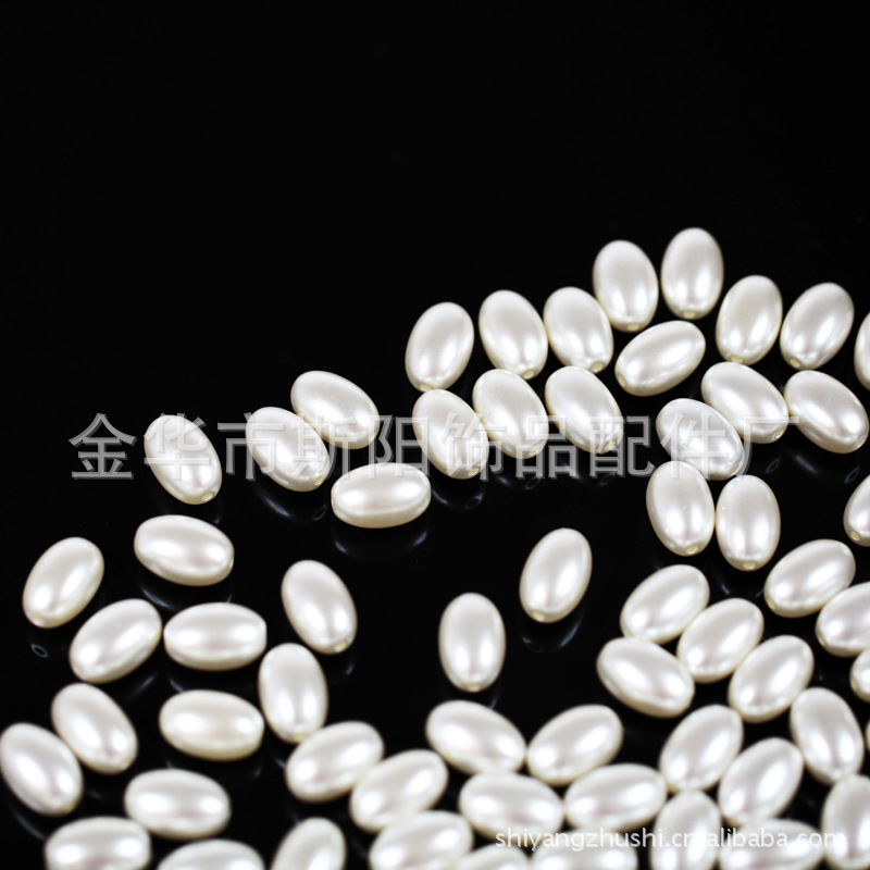 Wholesale of 12*18mm oval lacquered plastic pearl thread imitation pearl loose beads in off-white color, starting from one package details Picture