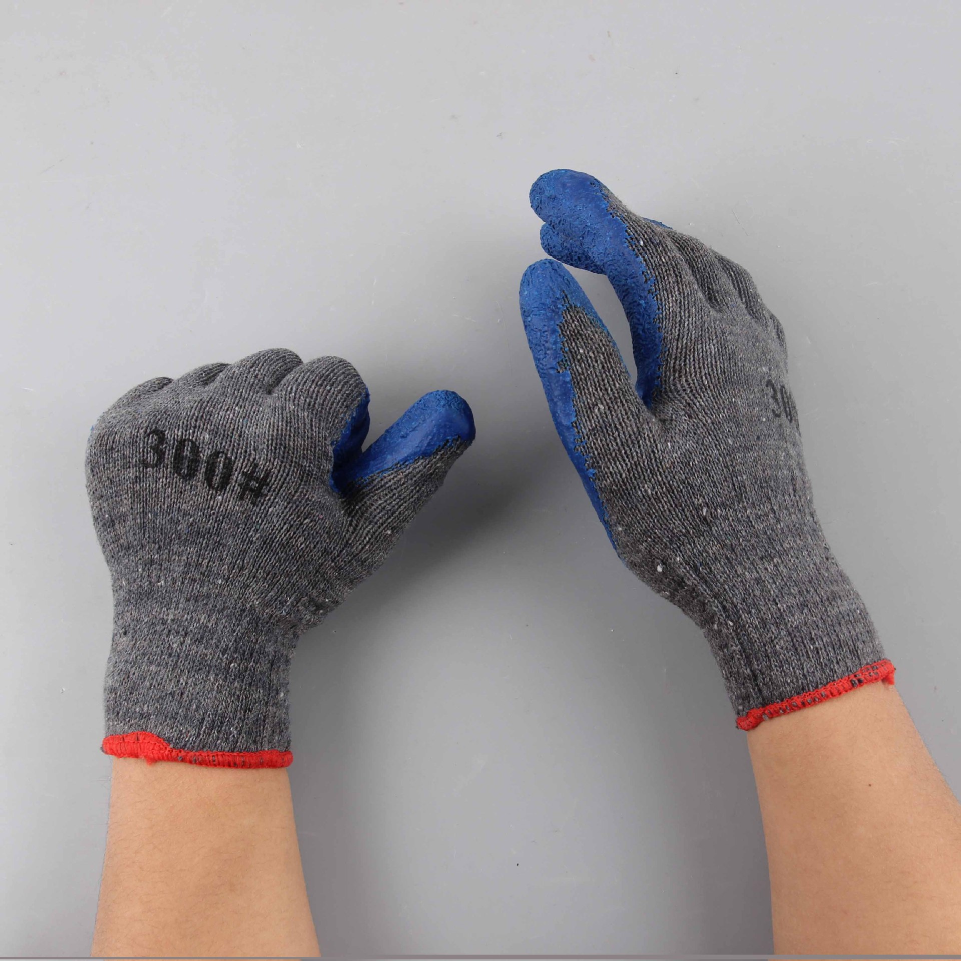 Industrial anti-slip and wear-resistant labor protection gloves, latex flannel impregnated with rubber, wrinkled grey yarn blue gloves Application Scenario