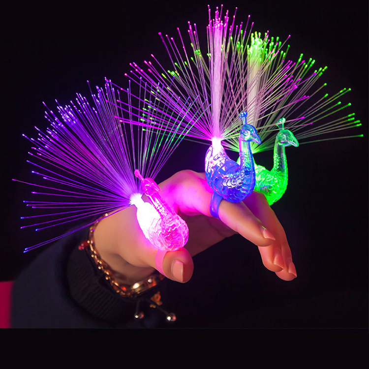 Night market children's small toys, kindergarten gifts, seven-color flashing peacock finger lights, square ground promotion, luminous rings and rings Application Scenario