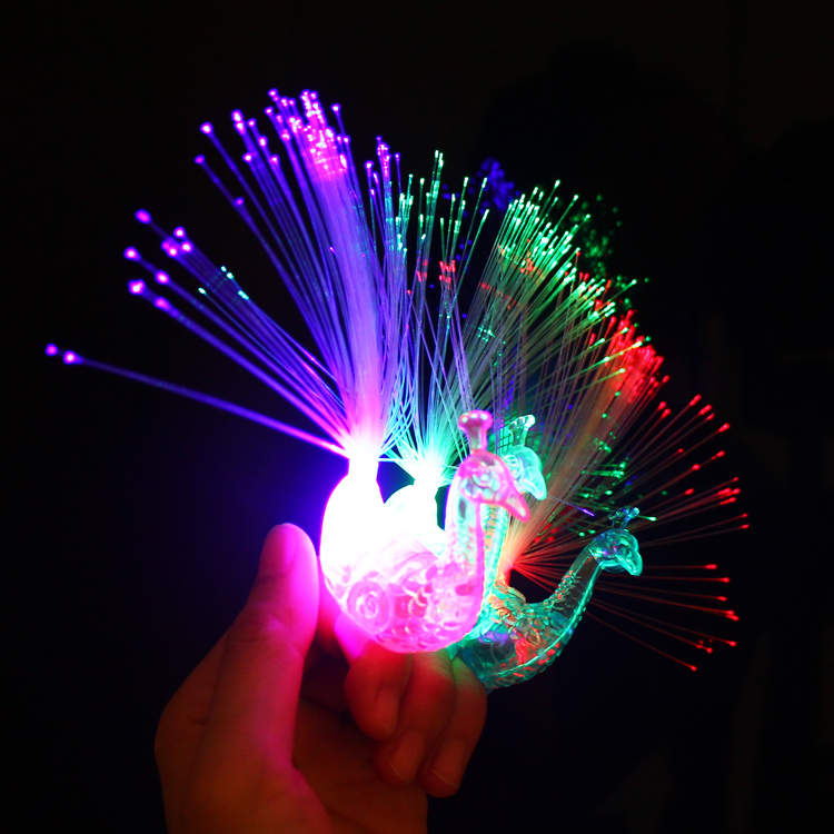 Night market children's small toys, kindergarten gifts, seven-color flashing peacock finger lights, square ground promotion, luminous rings and rings full figure