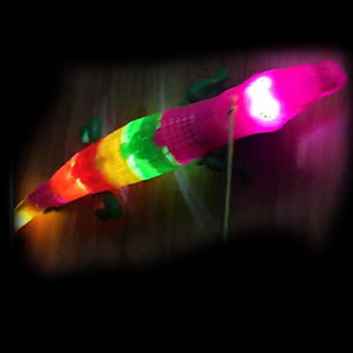The simulation animal toy street stall is selling a new type of all-directional electric crocodile that glows and crawles with music details Picture