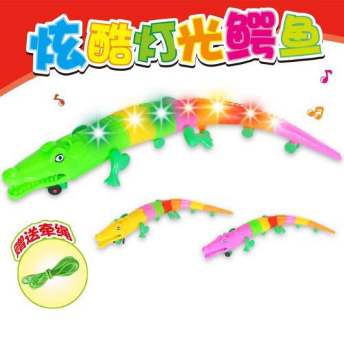 The simulation animal toy street stall is selling a new type of all-directional electric crocodile that glows and crawles with music full figure