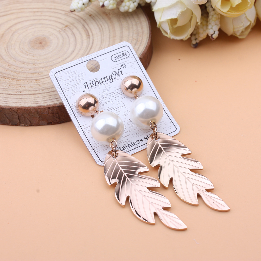 10-yuan store accessories titanium steel tassels suitable for round faces, trendy, versatile, fashionable and slimming earrings for women