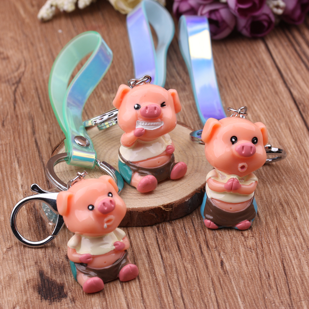 10-yuan store supply: PVC iriered leather rope keychain, glossy leather rope pendant, laser soft rubber hanging rope figurine Specification image
