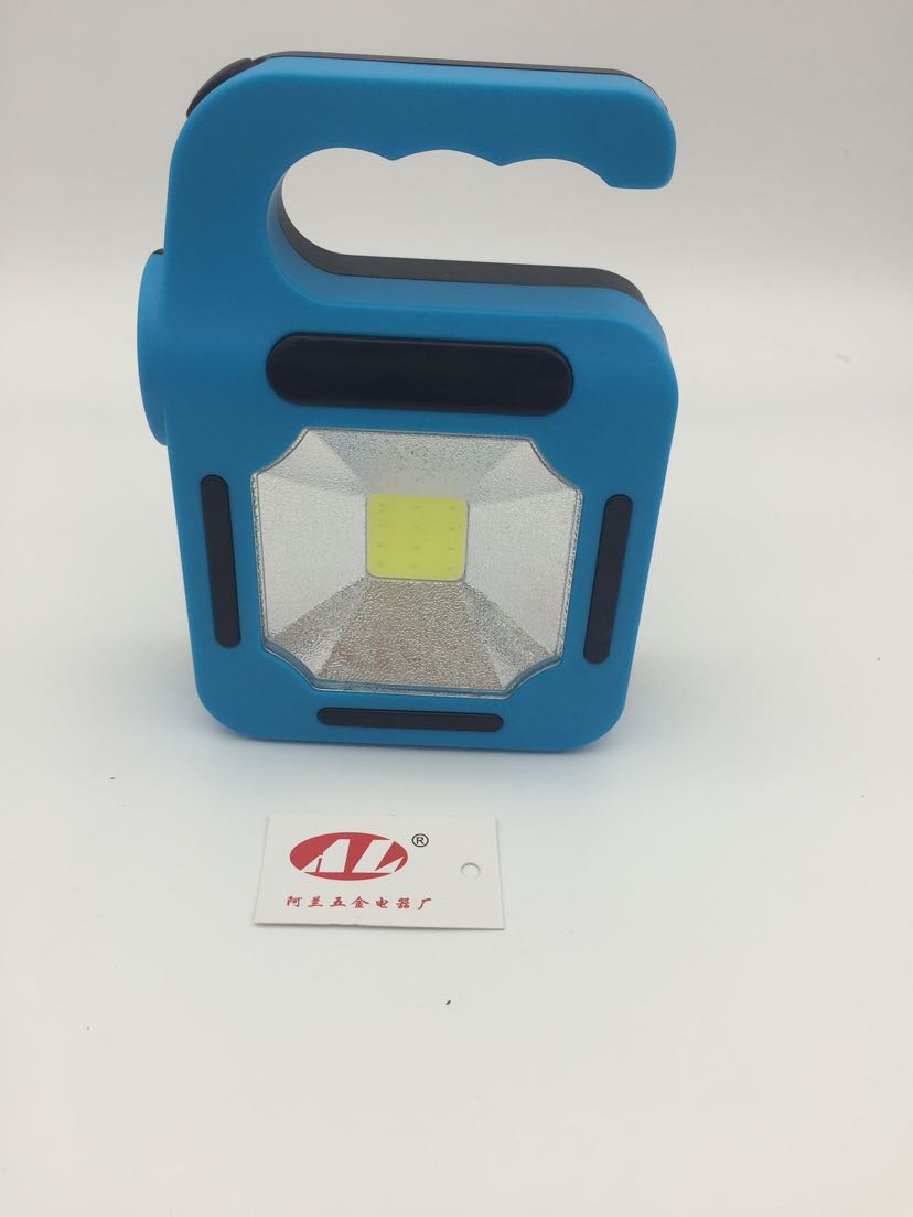 Small solar lamps hand in hand with lanterns outdoor camping lights