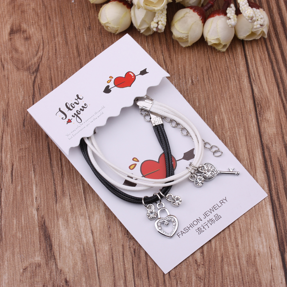 Ten-yuan store jewelry, necklaces, bracelets, couples, titanium steel leather ropes, bullet crosses, middle school students