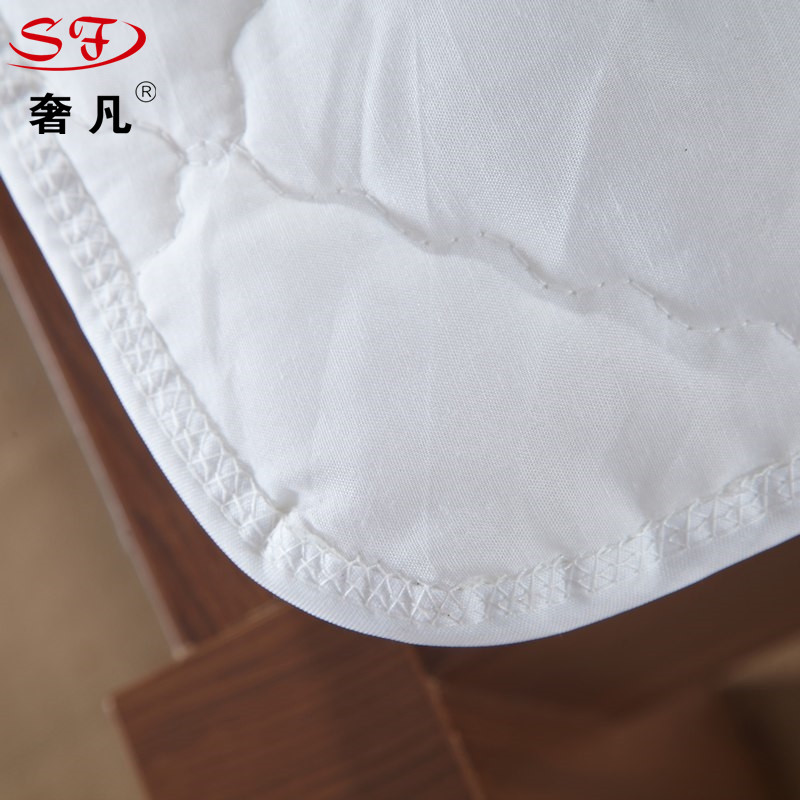 Hotel bedding: white anti-down fabric, all-cotton mattress; school household Simmons protective pad Application Scenario