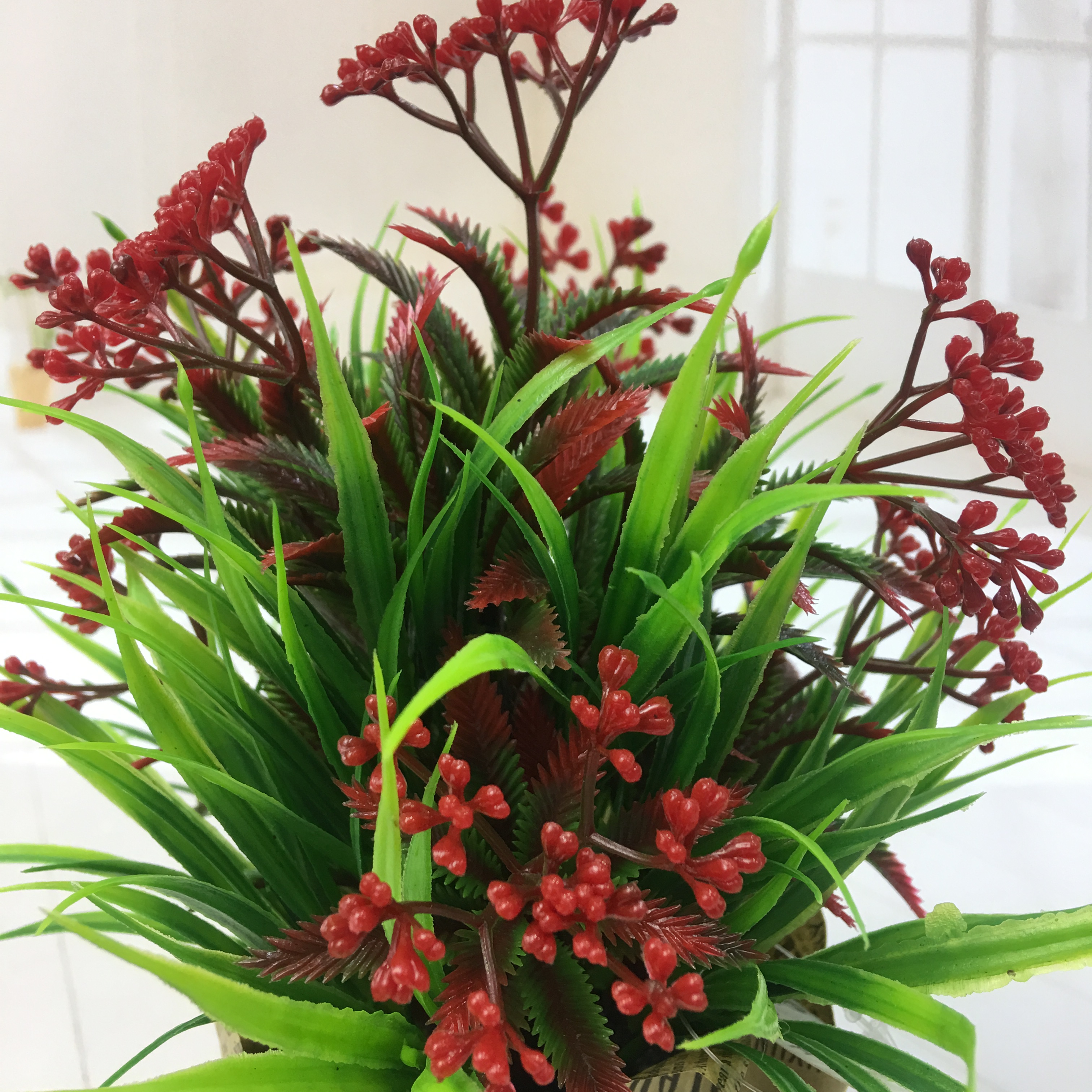 Mini artificial bonsai flowers, small potted plants, factory direct sales of artificial flower plants Application Scenario