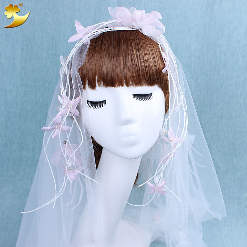 A long, soft and short wedding dress headscarf in the style of a white lady with a trailing Korean-style veil