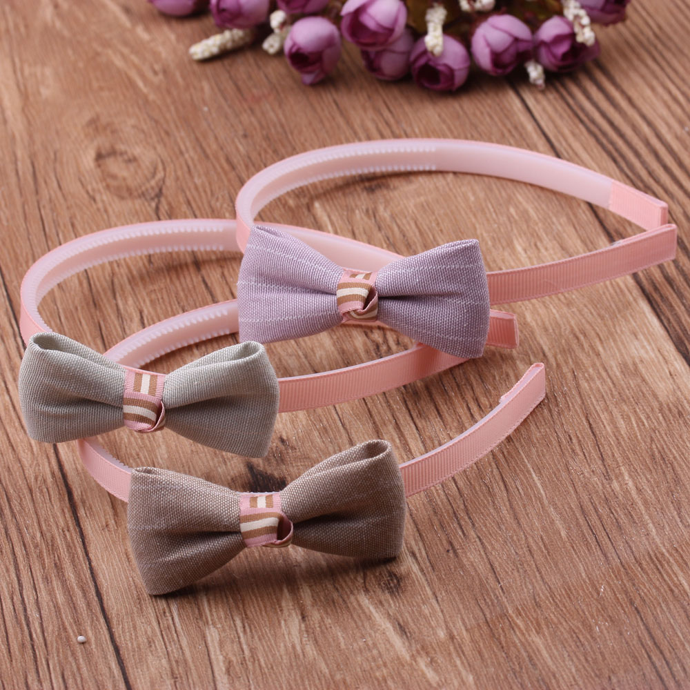 10-yuan store accessories: Children's hair band, simple and anti-slip, sweet hair band with teeth, cute bow headband details Picture