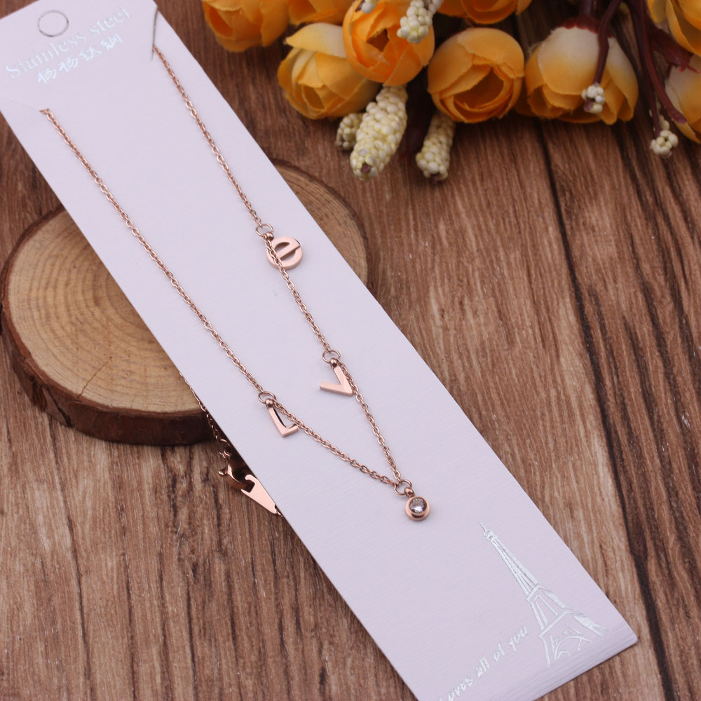 Colorful gold ring necklace, a trendy female Internet celebrity, simple and elegant, niche collarbone chain for women, 18K rose gold titanium steel pendant style Application Scenario