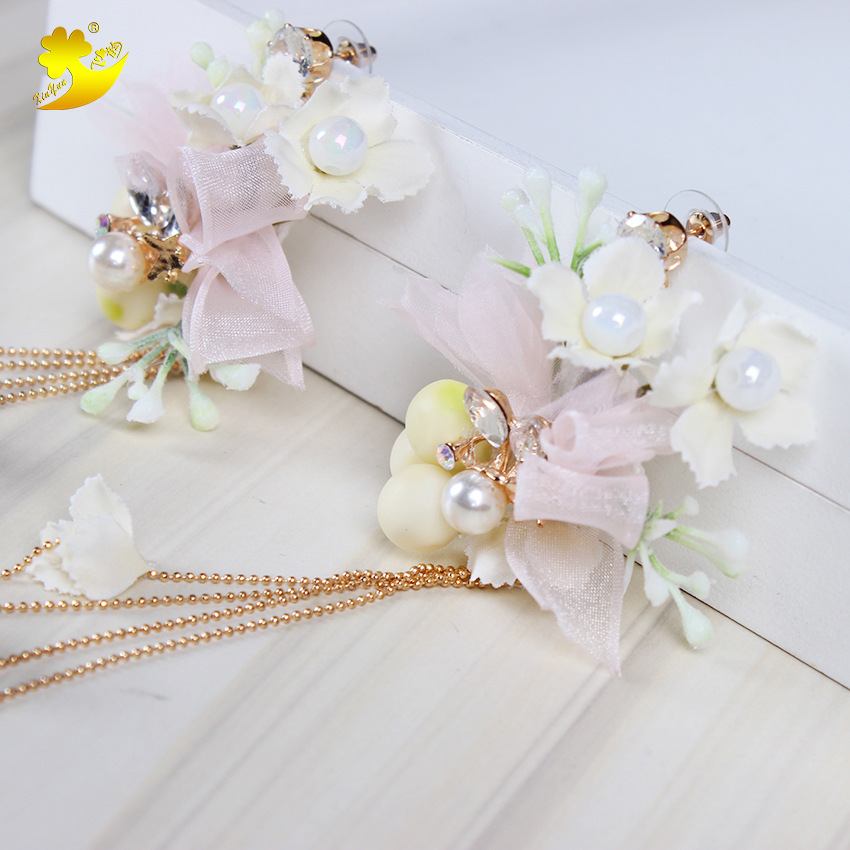 Direct sales of European and American flower earrings, forest girl vacation photography, retro and personalized tassel stud earrings, advertising promotion, Yiwu hair accessories Specification image