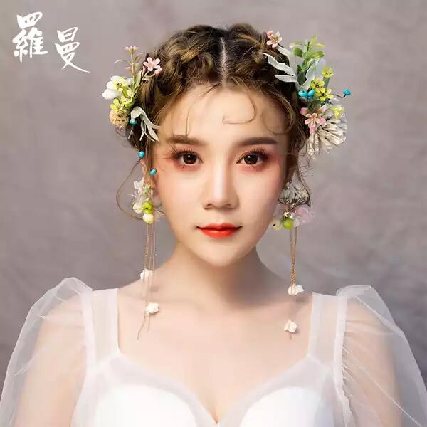 Direct sales of European and American flower earrings, forest girl vacation photography, retro and personalized tassel stud earrings, advertising promotion, Yiwu hair accessories
