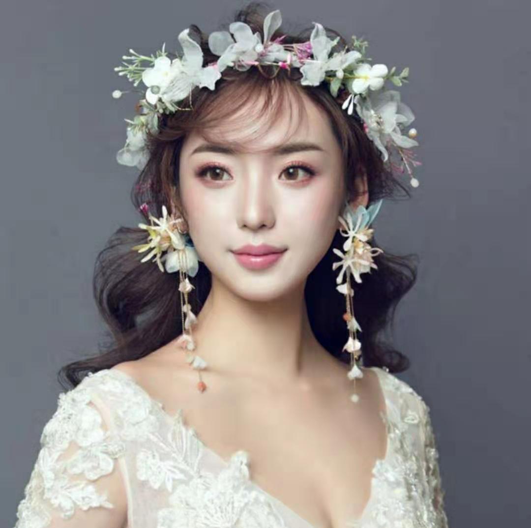 Xinyun's new European and American handcrafted imitation sunflower earrings, forest-themed fairy earrings, star street style bridal accessories