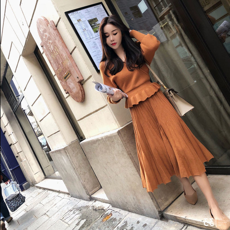This is a new autumn and winter knitted suit. It features a V-neck, a cinched waist, and a sexy, knee-length mid-length two-piece dress Specification image