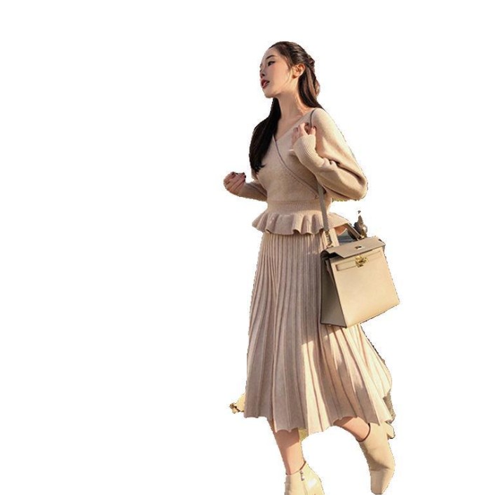 This is a new autumn and winter knitted suit. It features a V-neck, a cinched waist, and a sexy, knee-length mid-length two-piece dress Item Picture