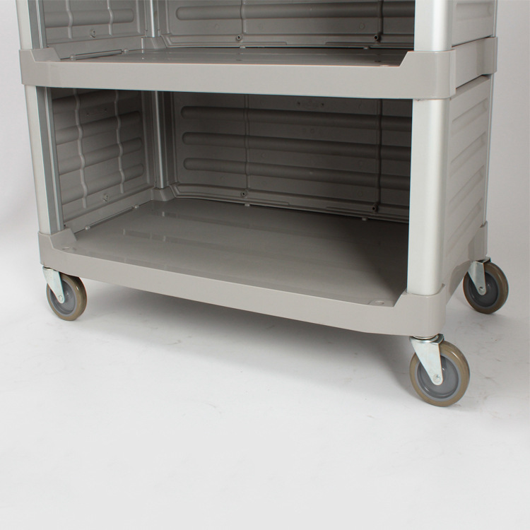 A three-layer plastic food delivery vehicle for banquets in southern star hotels, a large multi-functional hand-pushed service vehicle with a baffle Application Scenario