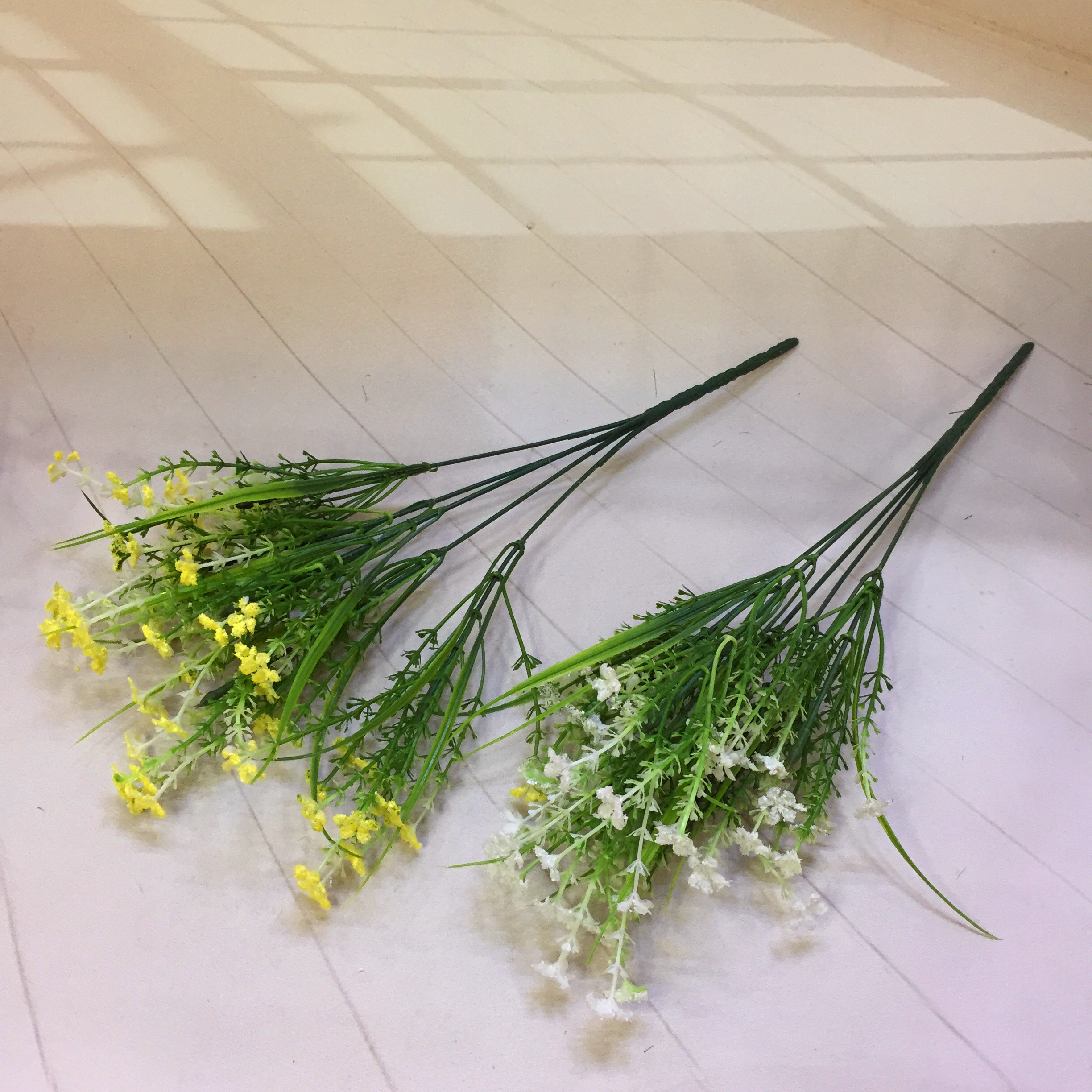 Factory direct sales of 5-head bamboo leaf foam 3-pronged grass artificial flowers Application Scenario