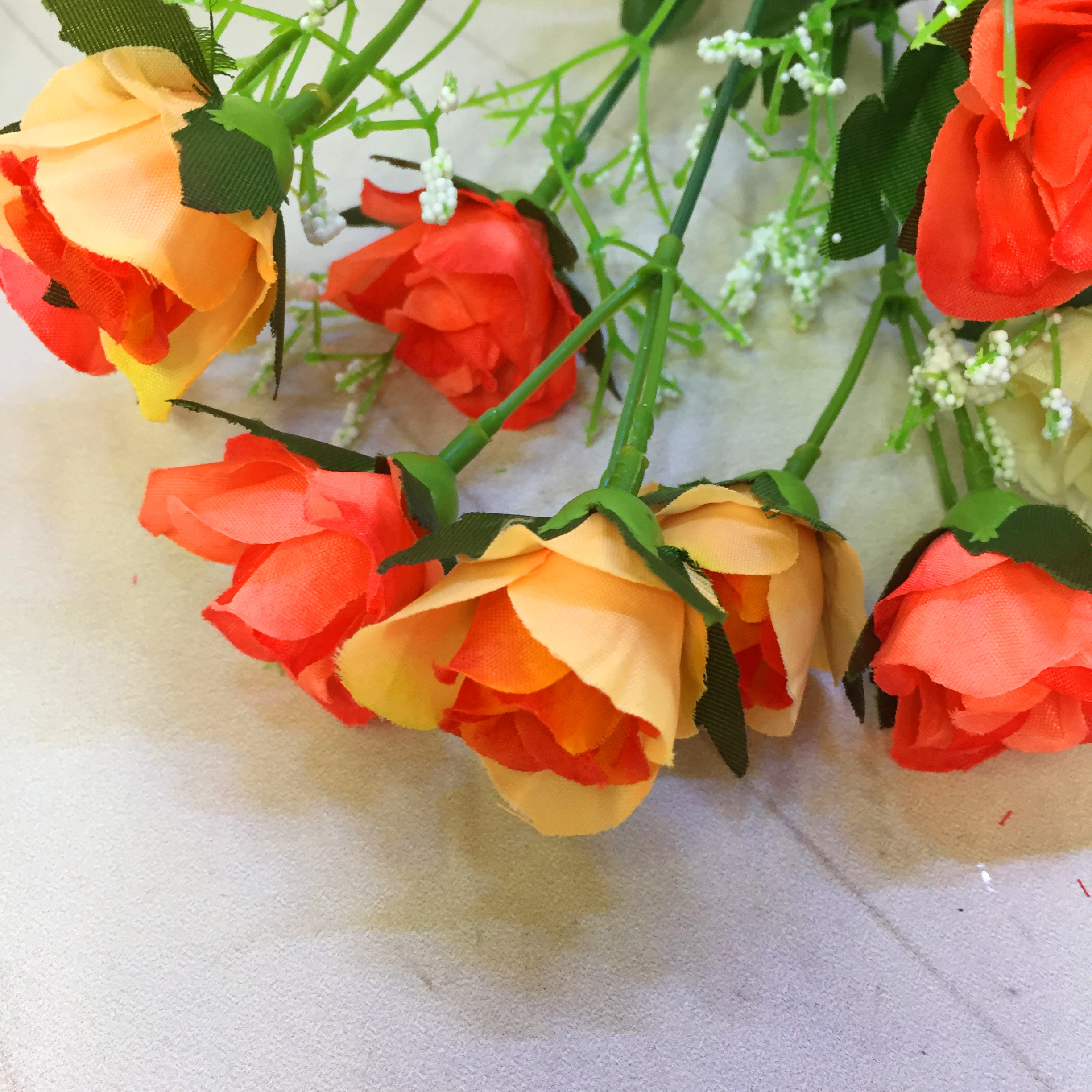 Factory direct sales of 5-head 7-flower wavy camellia artificial flowers Item Picture