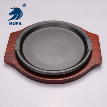 Factory direct sales of round cast iron grilling trays, teppanyaki steak grilling trays, professional iron plates for restaurants, hotels and bars wholesale
