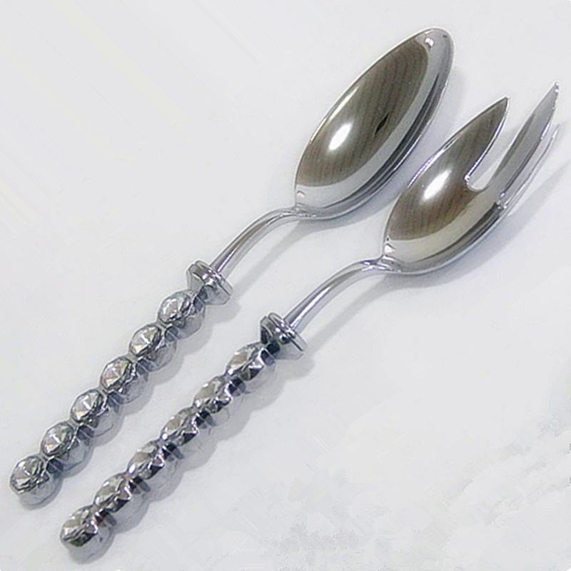 أما حزب الألماس المغطى بالزجاج، الذي يضم # ملعقة من الشوكة الذهبية Item Picture