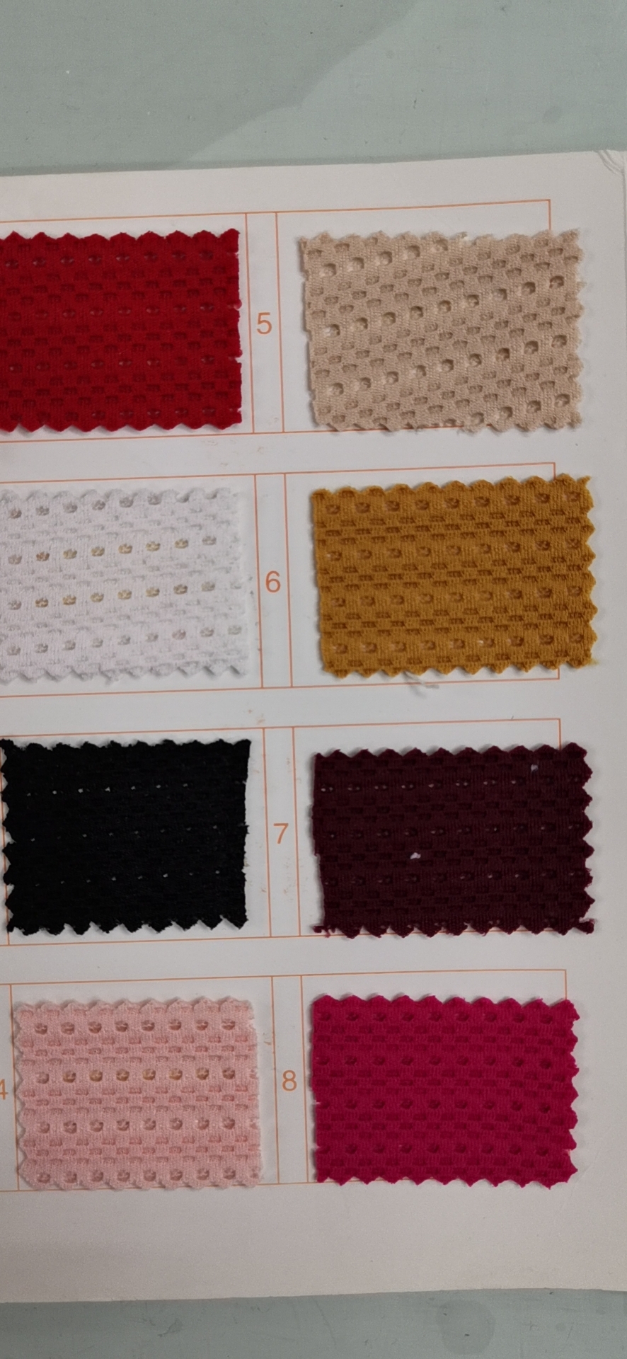 Factory direct sales, direct supply of fashionable warp knitted solid color custom jacquard fabric, high-precision knitting