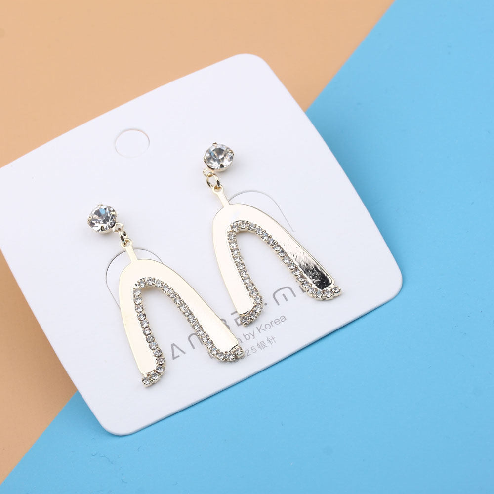 Pudding Station Boutique, trendy and popular long tassel pearl stud earrings, feminine charm earrings, and exaggerated and unique earrings details Picture