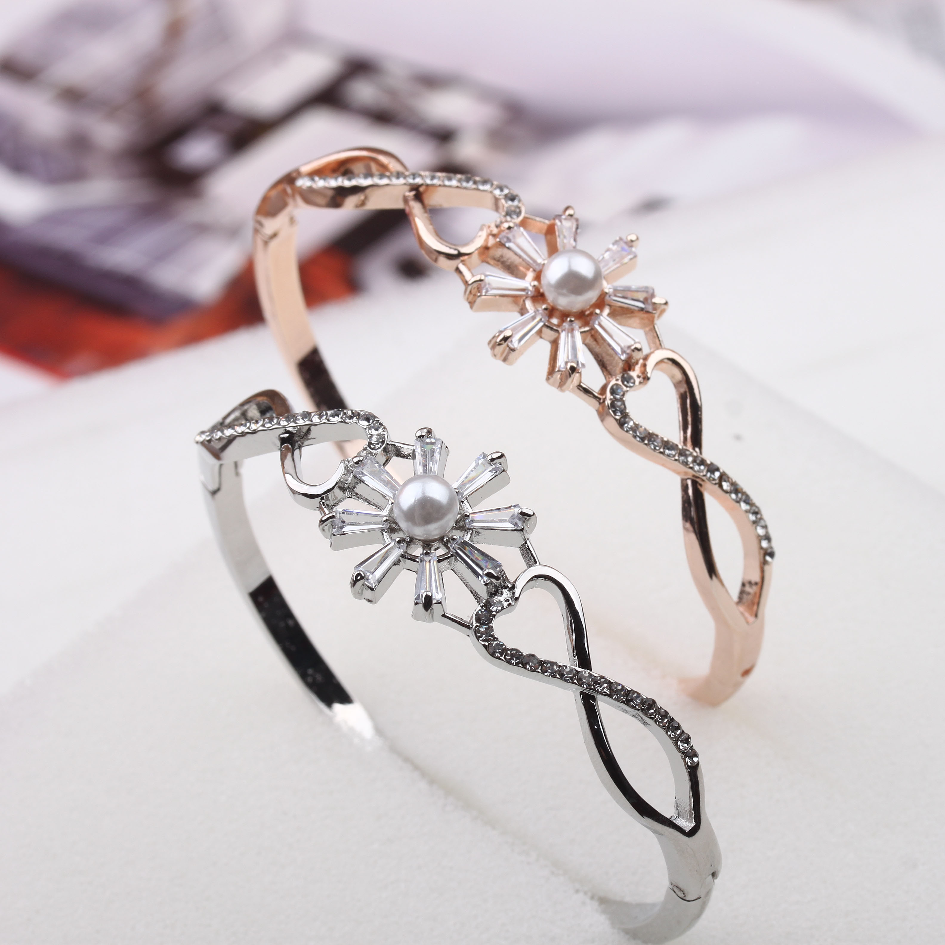 Pudding Station Boutique offers 18K rose gold bracelets with diamond nails that won't fade for women