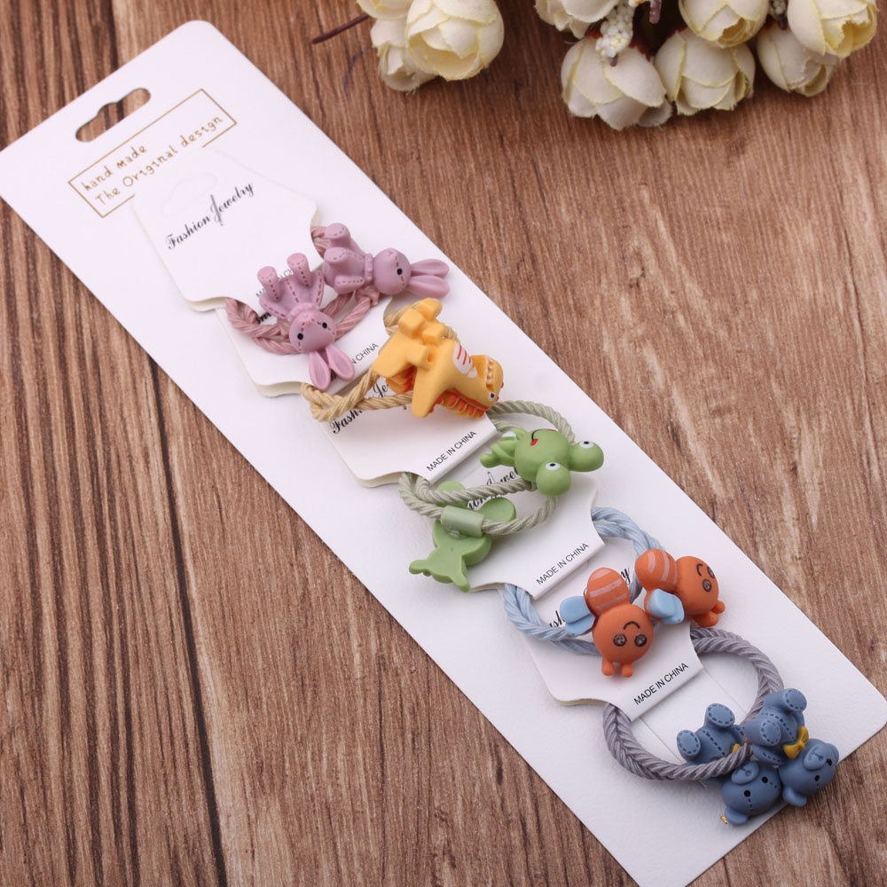 A cute little girl's hair tie with a rubber band, a popular hair band for girls and children, and a hair accessory details Picture